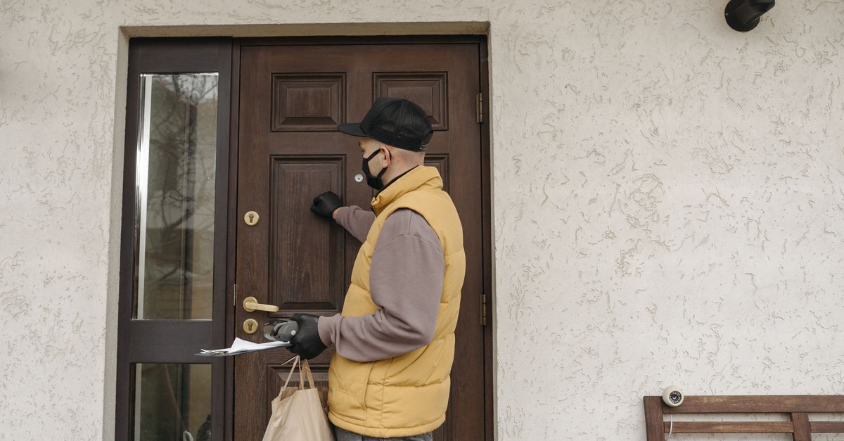 locksmith unlocking front door — Skokie Locksmith Chicago